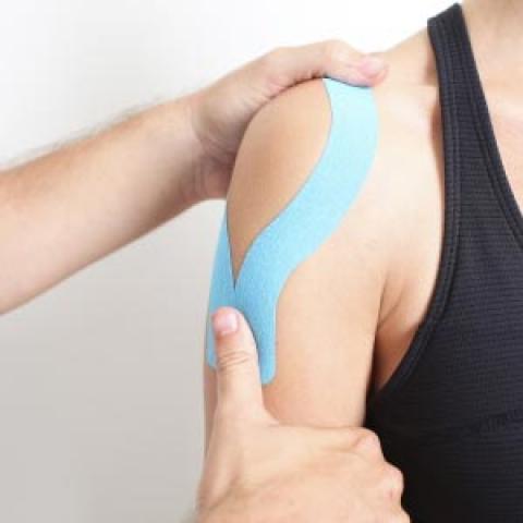 vergoeding fysiotherapie tape om arm fysio