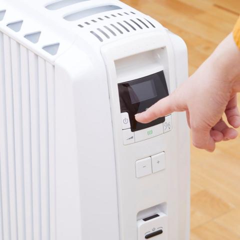 Elektrische kachel bedienen